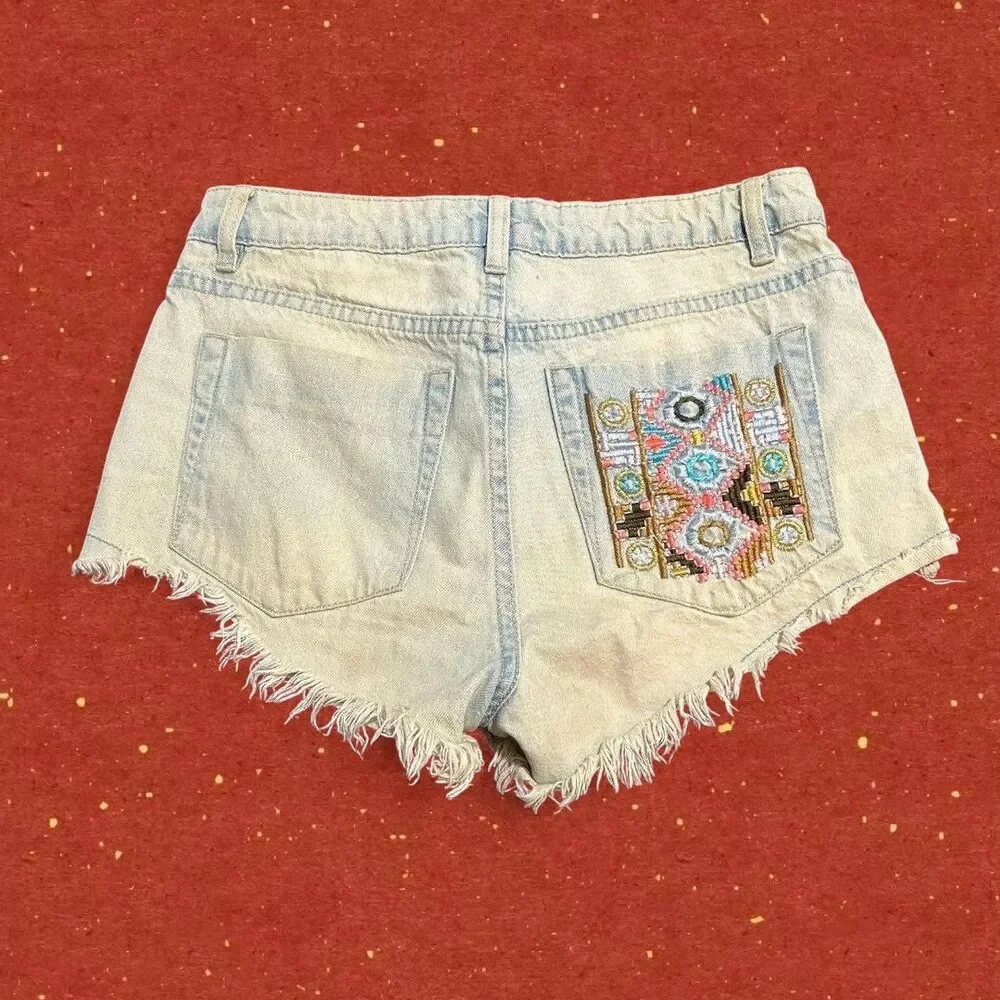 Distressed denim shorts